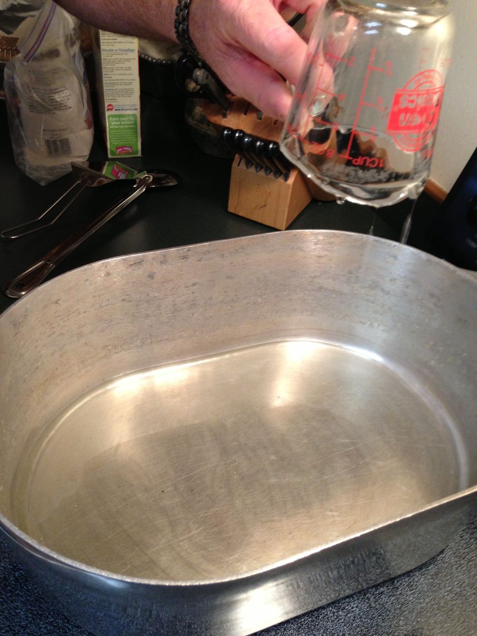 Add the vegetable oil to a medium hot stove and wait until hot. The oil should start to faintly swirl and move.