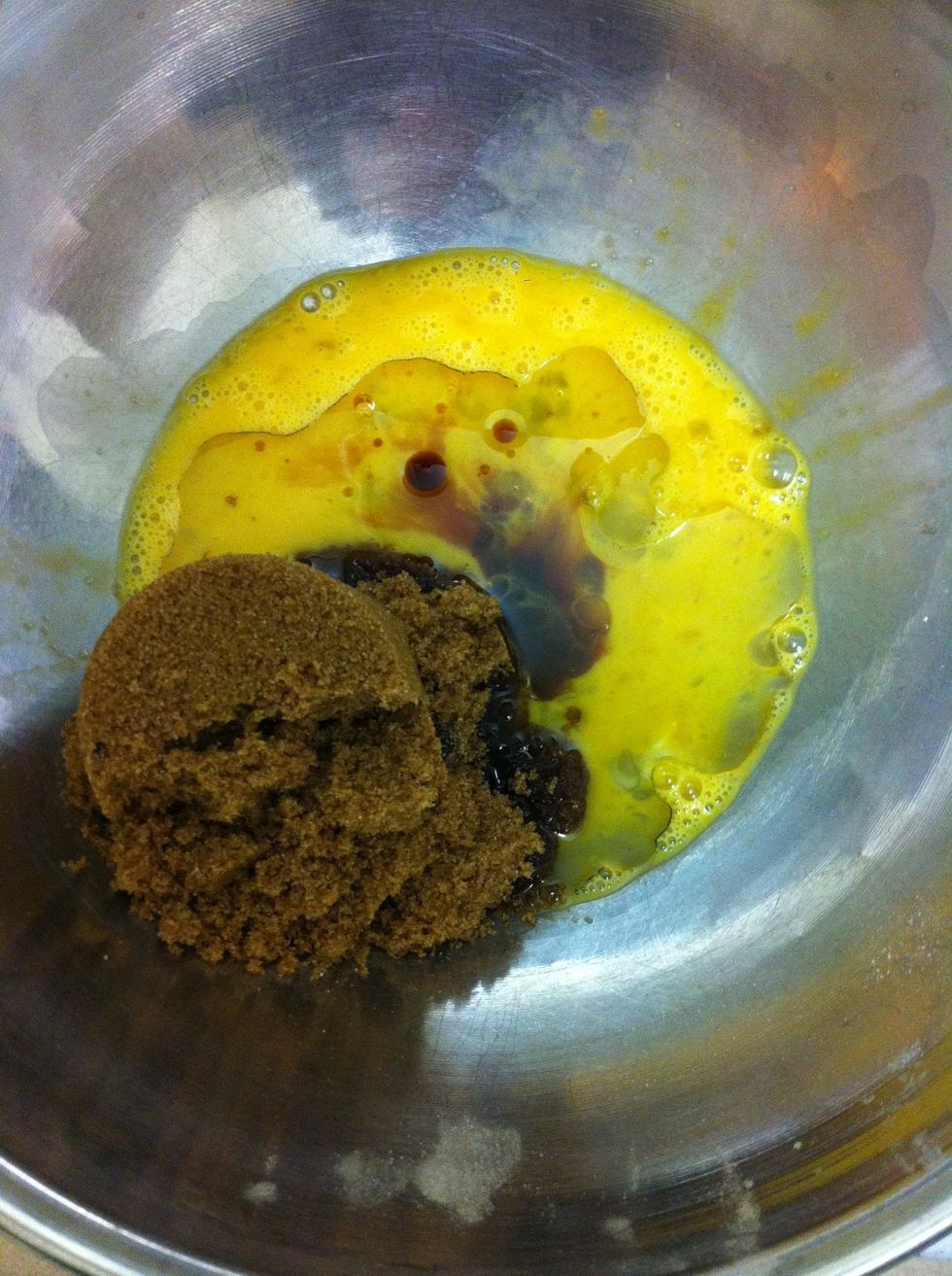 Add the vegetable oil, vanilla, and brown sugar into the beaten egg