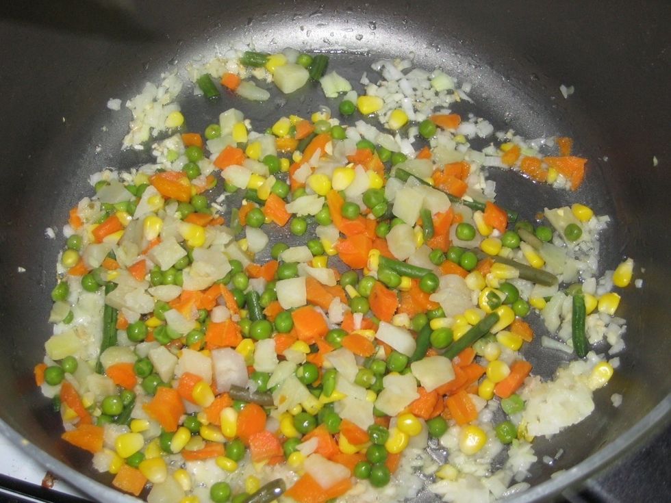 Add the vegetables and stir.
