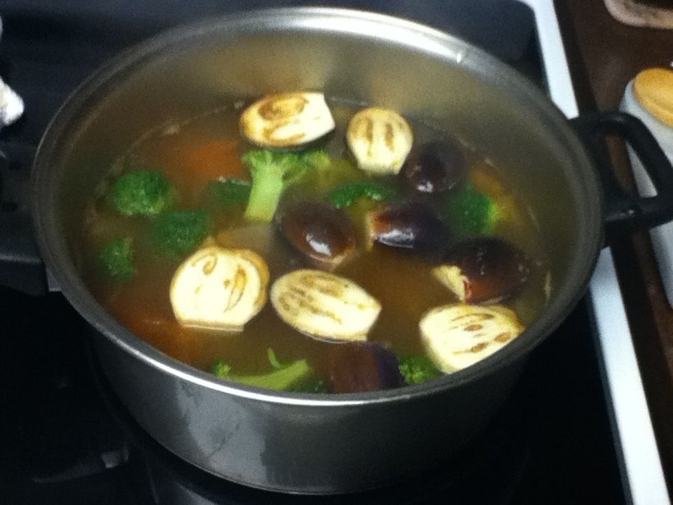 Add the vegetables... I made a mistake because i added the brocolli.. Only add the eggplant and mushroom. Let it simmer for about 2 min