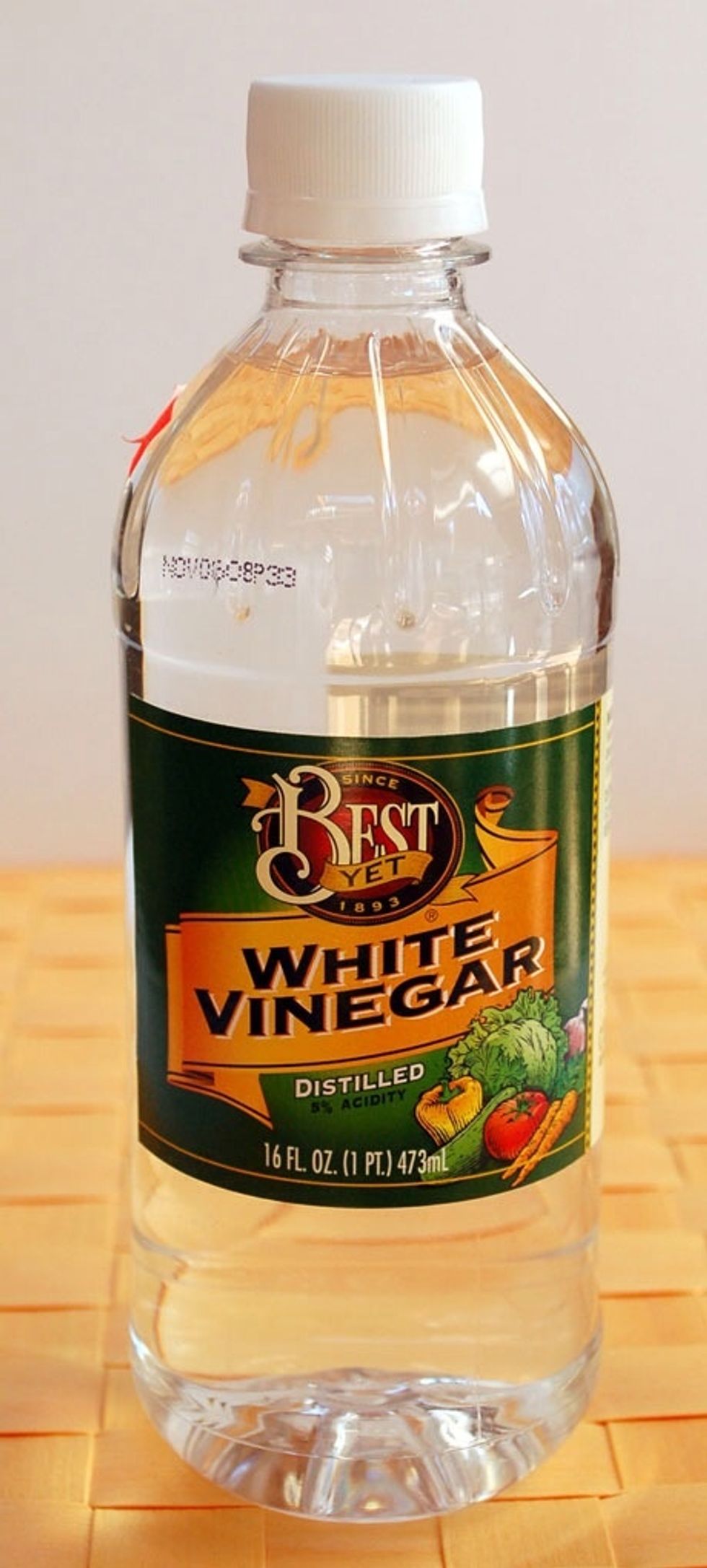 Add the vinegar. If you made your own buttermilk, you still need this vinegar. The acid reacting to the chocolate is what gives re velvet it's special taste.