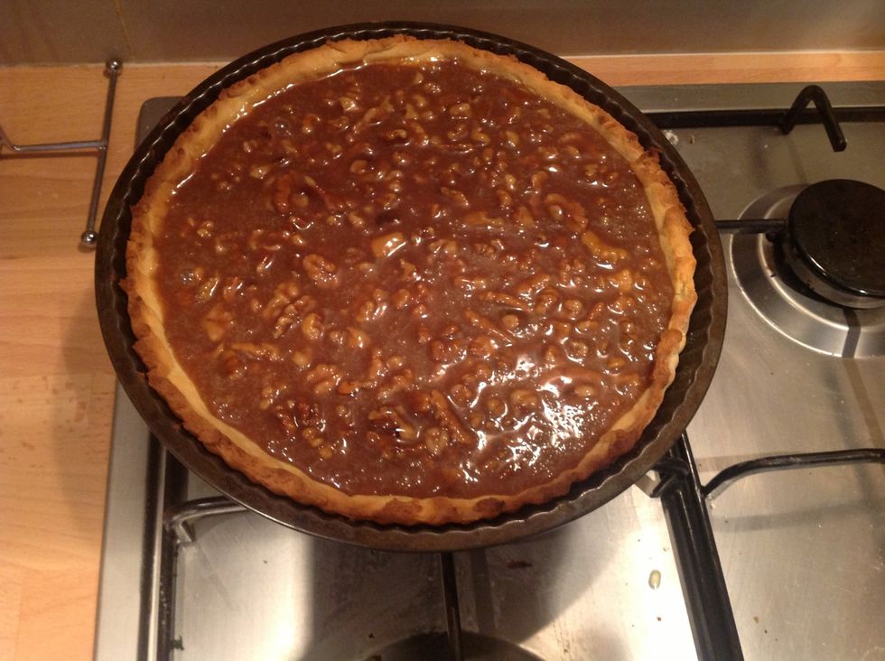 Add the walnuts and poor into your tart dish