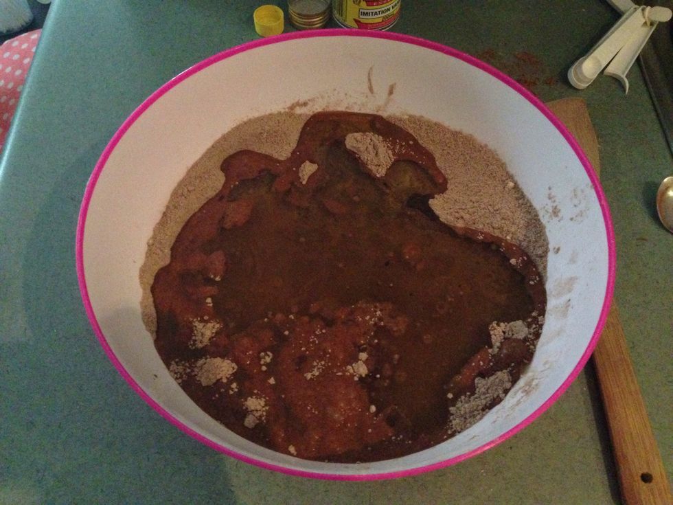 Add the water, olive oil and vanilla essence