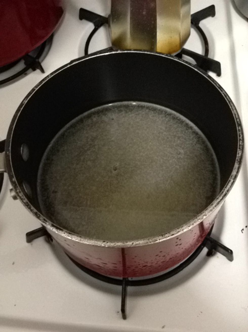 Add the water. Turn on high heat and bring to boil.