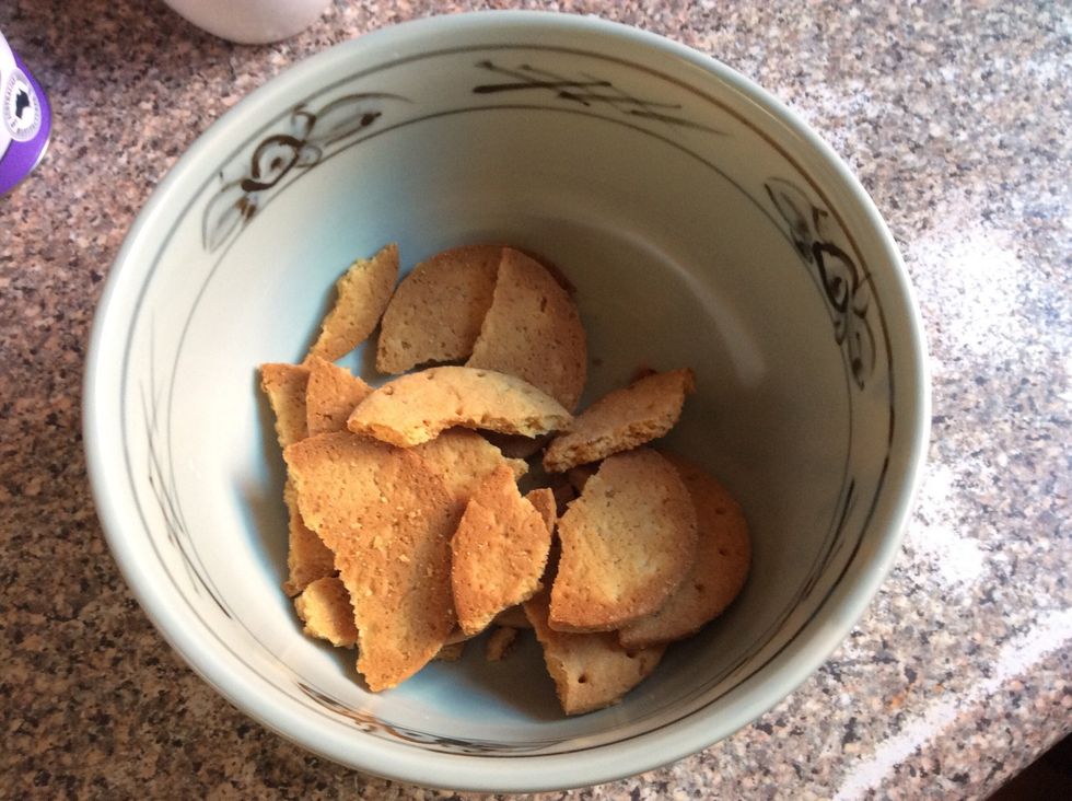 Add the  wheat biscuits into a bowl
