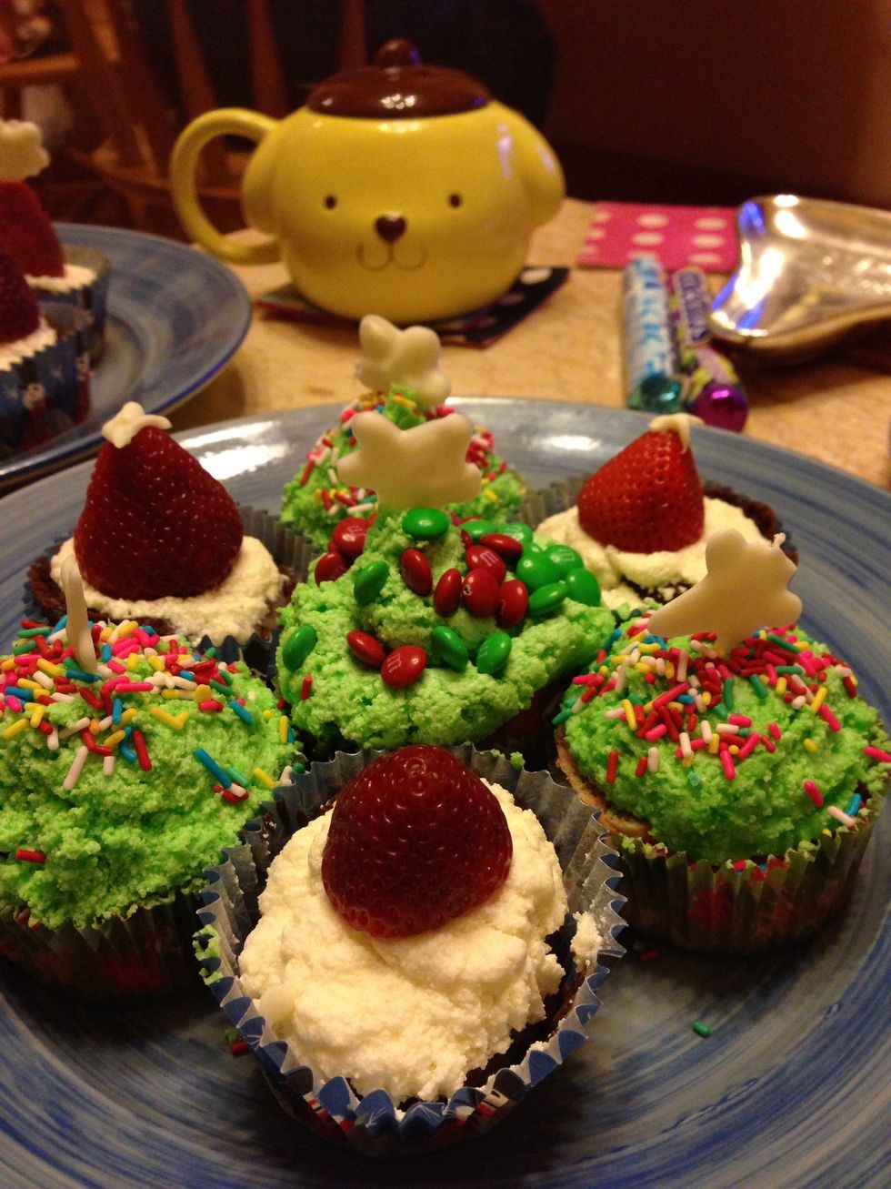 Add the white icing and strawberry on top of it:)