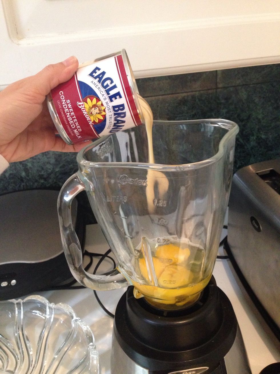 Add the whole can of condensed milk