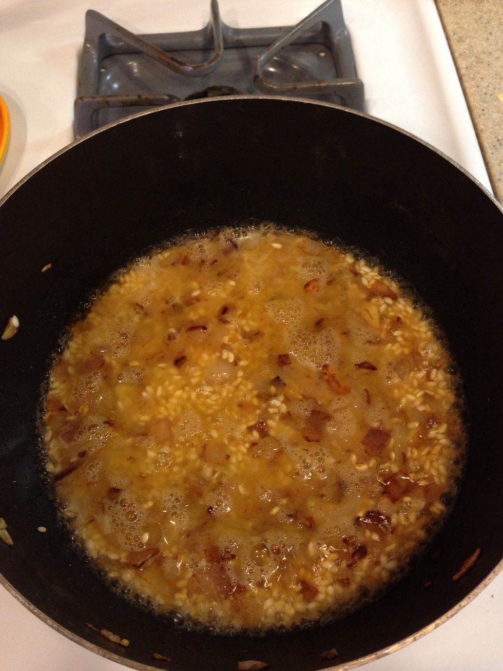 Add the whole mini bottle of wine (or a cup of whatever you have lying around the house).