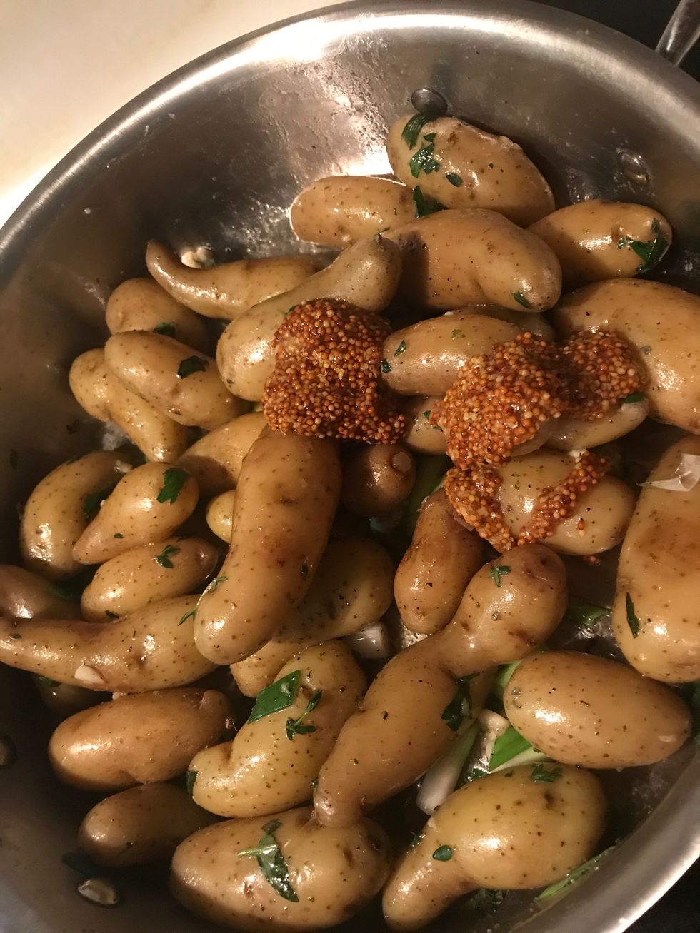 Add the whole seed mustard Stir to coat Reduce heat Cover for 2-3 minutes