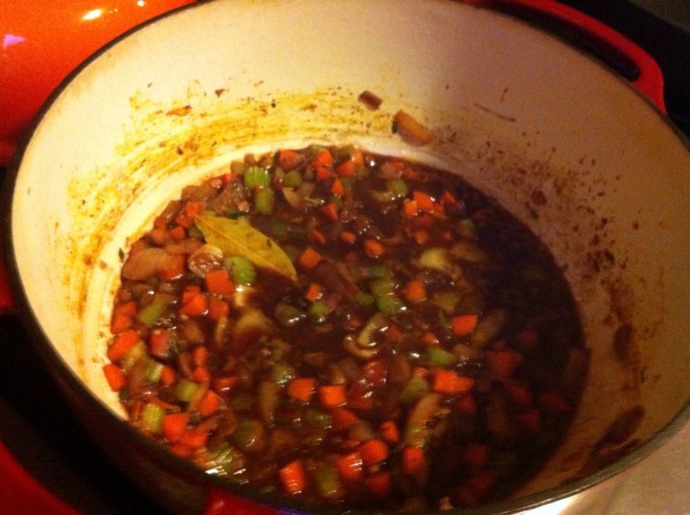 Add the wine, increase heat and bring to boil.