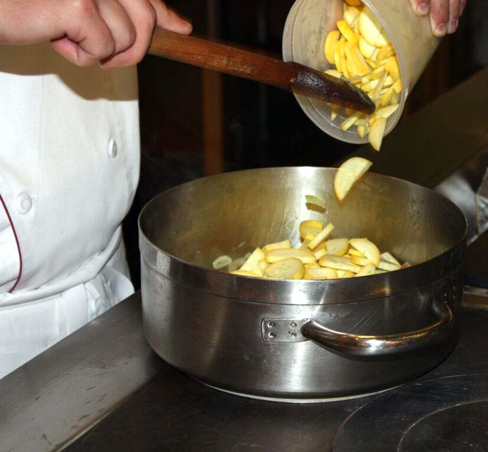 Add the Yellow Summer Squash, along with another pinch of salt, and again, allow to cook until the squash is fully cooked and soft.