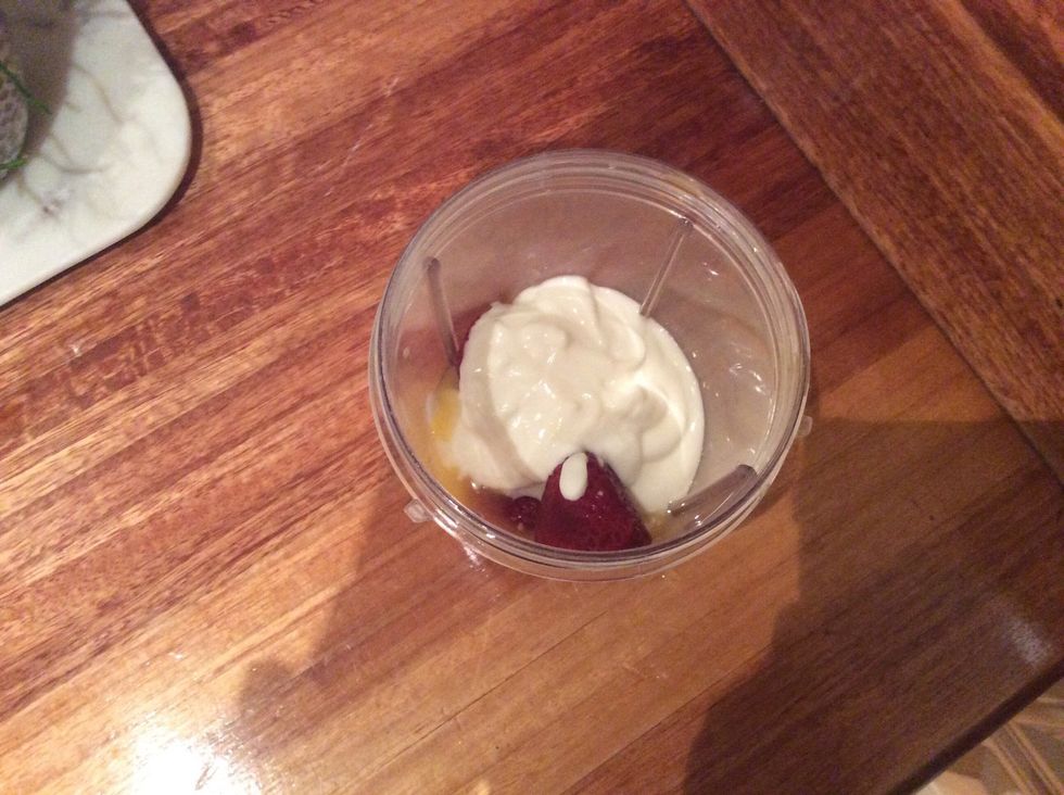 Add the yogurt. Plain yogurt will give creaminess to your smoothie and highlight the flavor of your strawberries without overpowering it. You can also add ice cream and/or strawberry juice if desired.