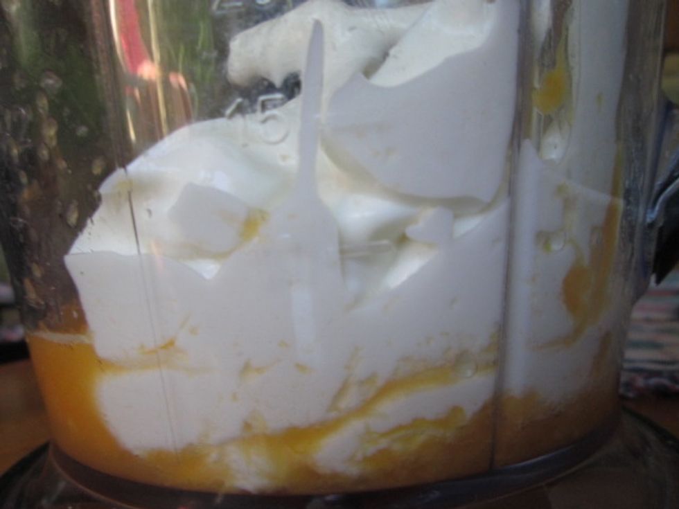 Add the yogurt to the blender. I like to use Greek yogurt because doesn't have too much fat and has a lot of protein.