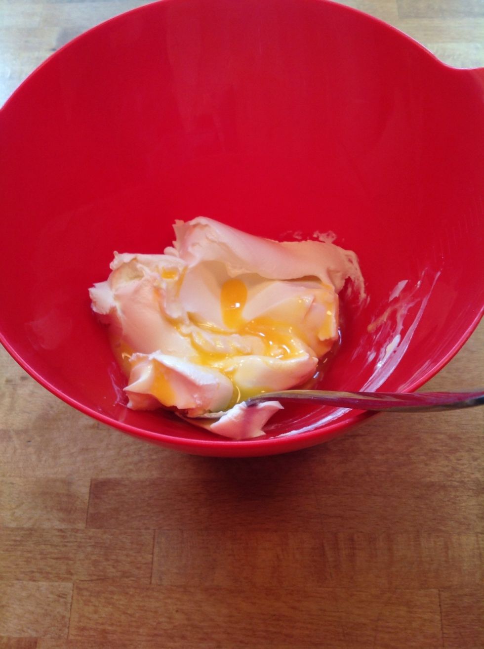 ...add the yolk to the cream cheese and mix!