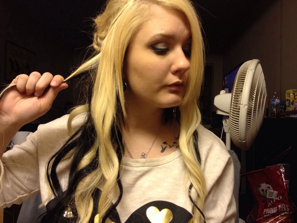 Add them to another chunk like you did to the other side and braid like you did on the other side