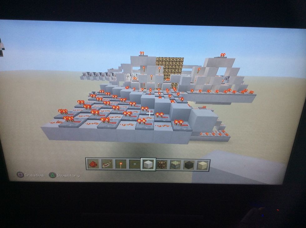Add these blocks, redstone and repeaters.