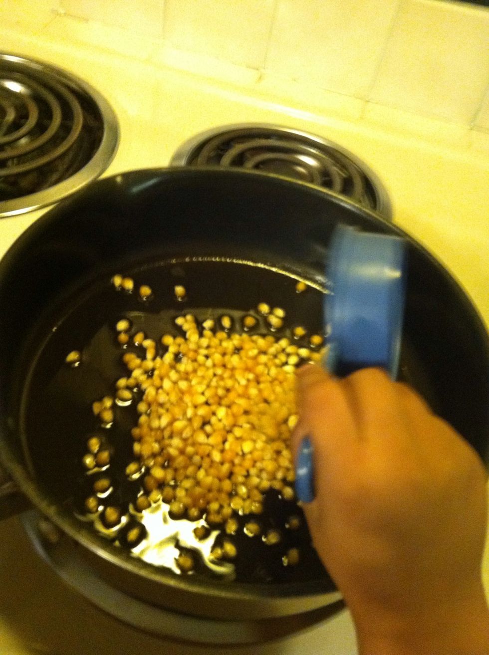 Add three cups of popcorn. This will make around 6 popcorn balls depending on the size of the balls you make