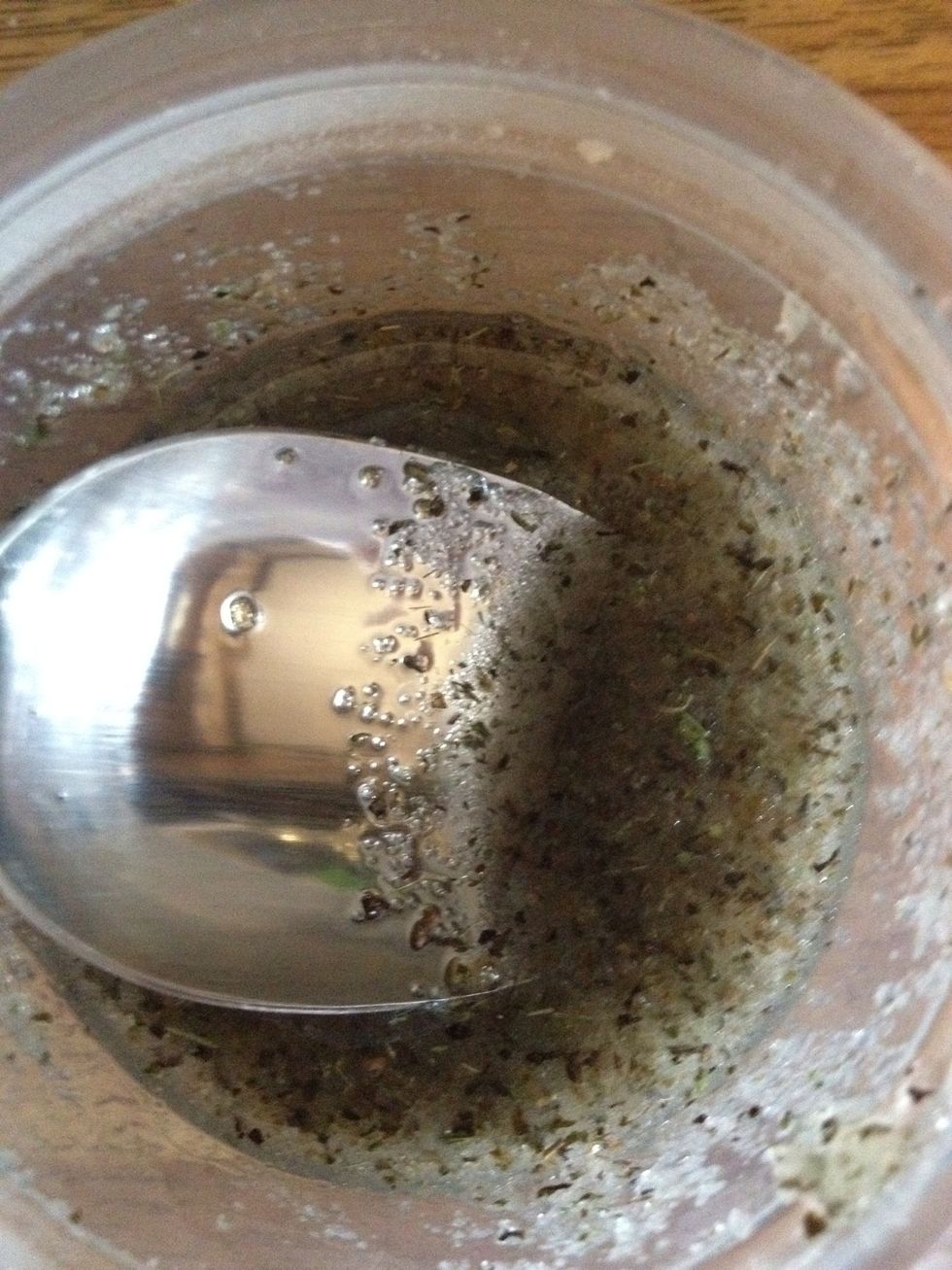 Add three spoonfuls of olive oil and mix well.