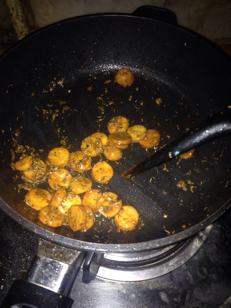 Add thyme, oregano, chilli sauce, soy sauce, and saut\u00e9 the ingredients.