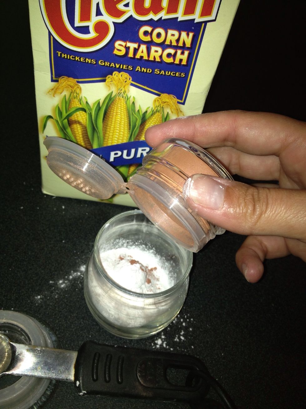 Add tinted face powder. I used a cheap bronzer, but any lose tinted powder is fine. This should be only slightly tinted. It's not for concealing, but for absorbing oils & holding your makeup in place.