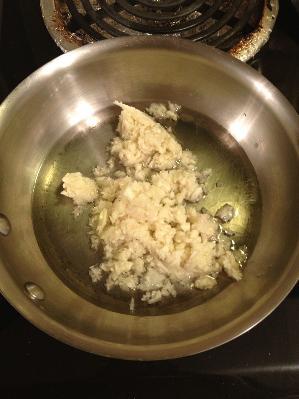 Add to a medium-high heated pan with about 1.5 tbsp vegetable oil. Toast/fry the garlic but watch closely so it doesn't burn! Stir often. Takes about 7-10 minutes.