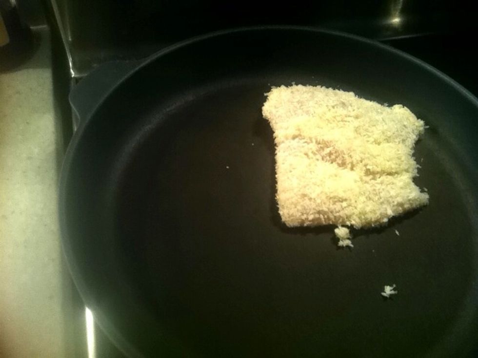 Add to a non-stick fry pan (or you can bake).  Flip when it's golden and cook through.
