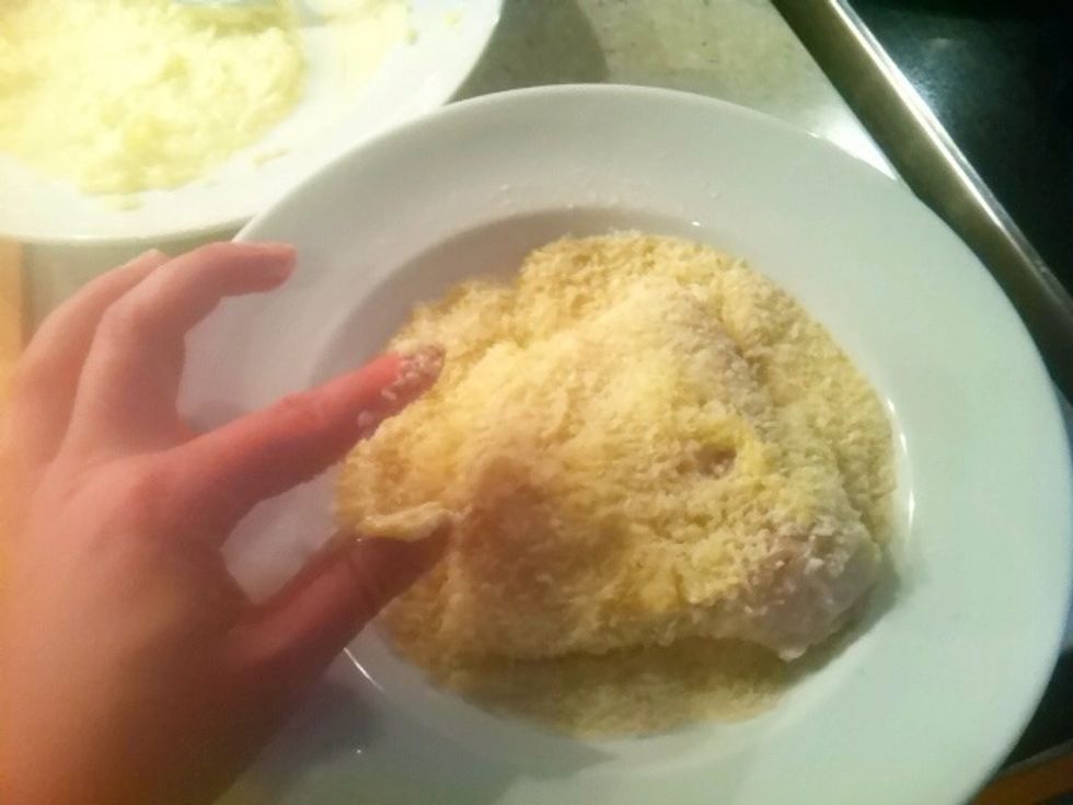 Add to bread crumbs, and gently pat down so that it is completely covered.