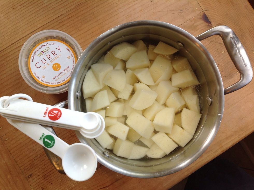 Add to pot then fill with COLD water, just enough to cover the potatoes. Add 1 tablespoon #2 Curry in a Hurry to water. This helps flavor the potatoes while cooking.