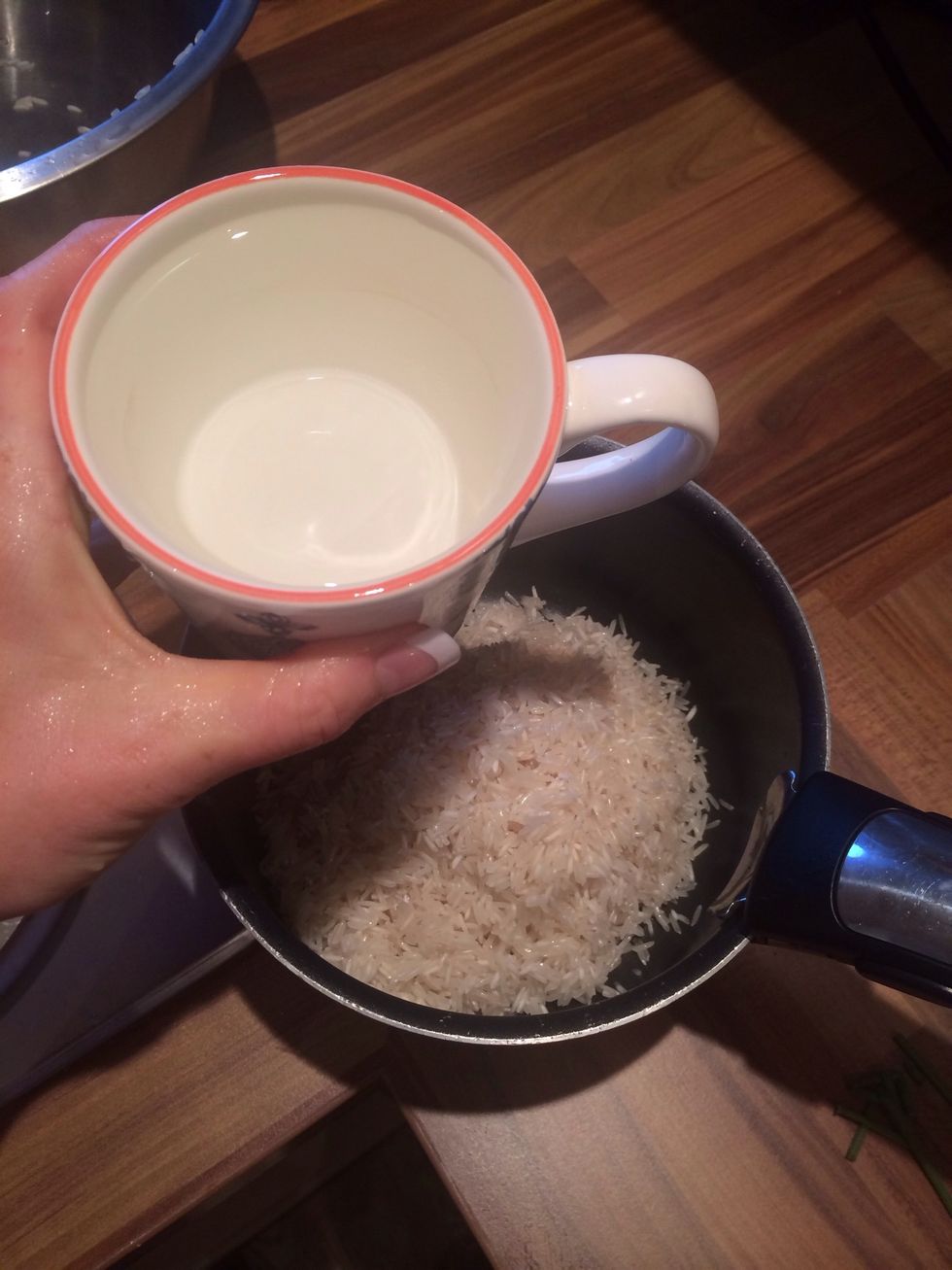 Add to small pan with 1 cup of water per cup of rice!