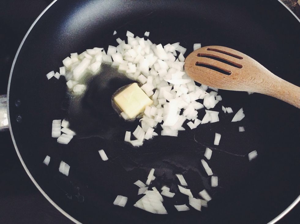 add to the pan 1 tbs of butter and onions. Saut\u00e9 until the onions become translucent.