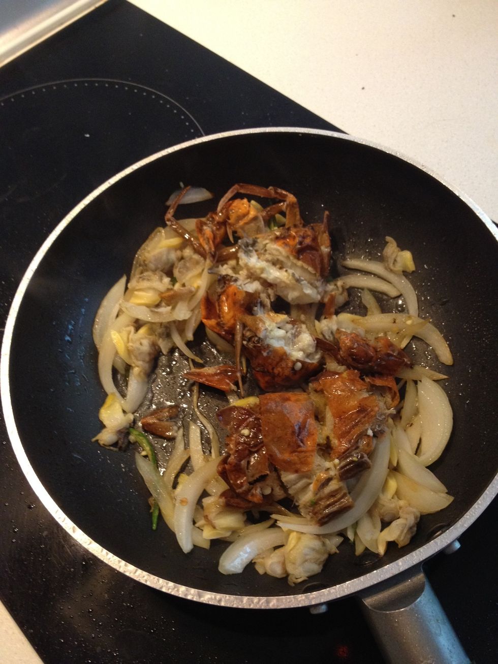 Add to the pan and stir fry until clams are cooked