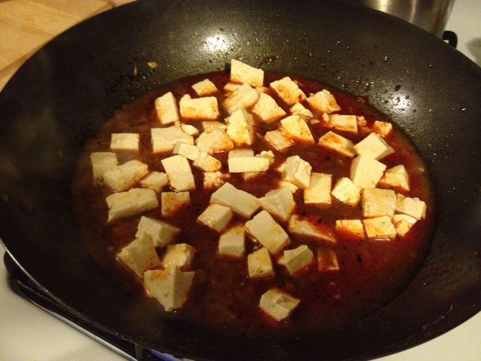 Add tofu cube nicely, and stir gently cook it for 5 minutes.