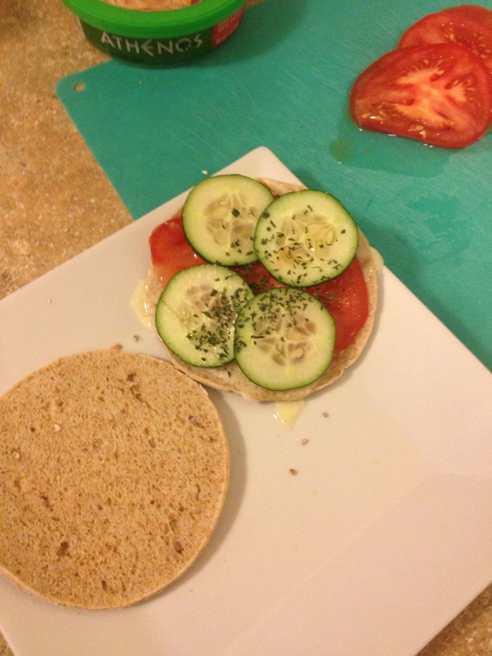 Add tomato and cucumber with cilantro