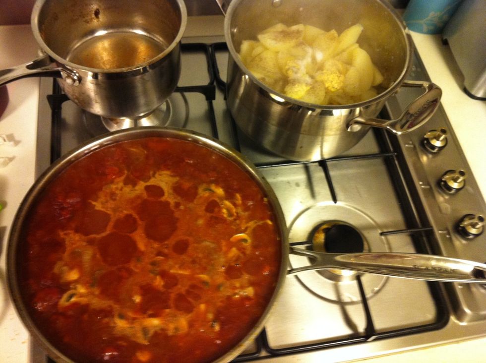 Add tomato paste, saut\u00e9 til fragrant, add stock and bring to the boil. When potato is soft drain and return to pan with butter, salt & pepper.