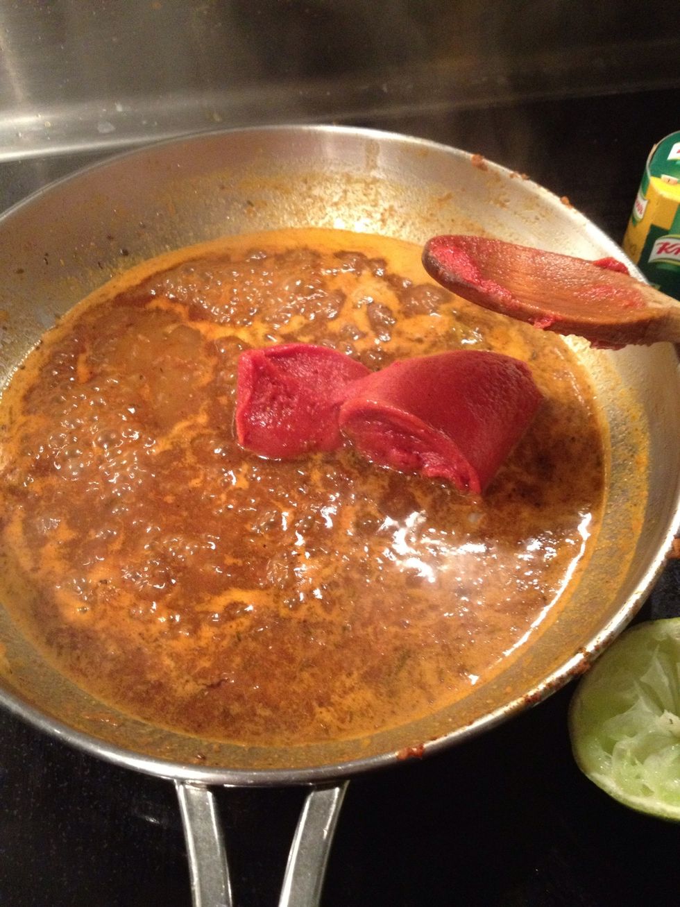 Add tomato paste.