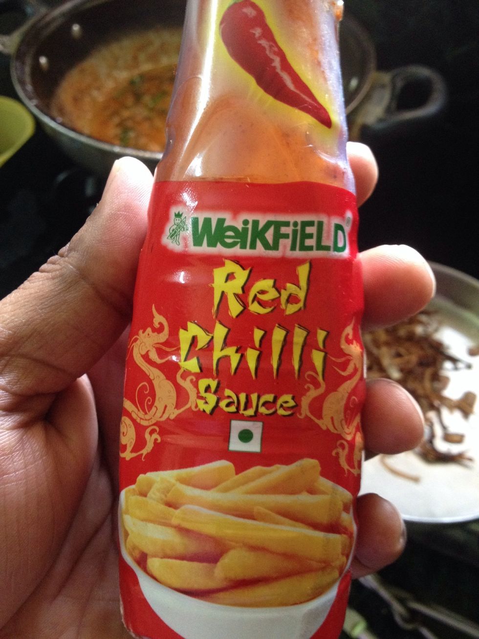 Add tomato pur\u00e9e and red chilli garlic sauce to it...