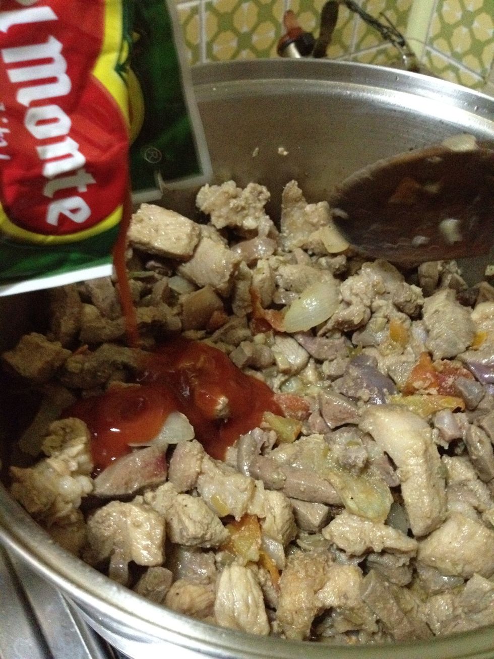 Add tomato sauce. Let simmer on slow fire for 20 minutes