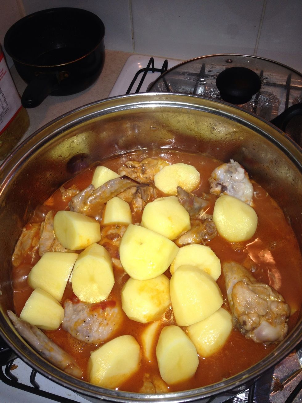 add tomato suace and a little water until amply covered add potatoes simmer untill potatoes are cooked