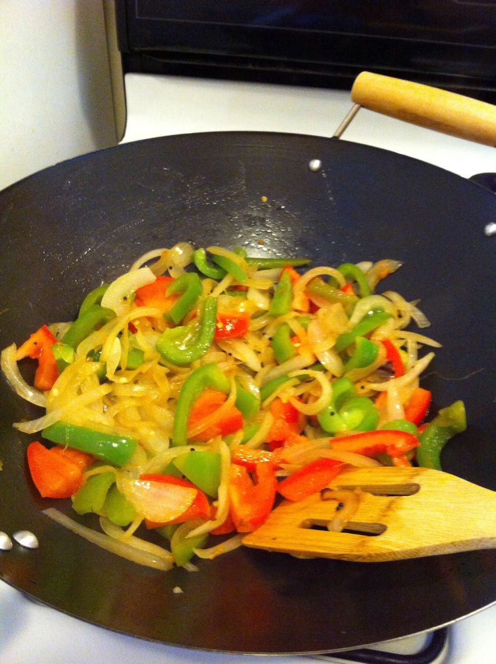 Add tomato to the pan and stir it. Let it cook for 2 mins. Stir in between to ensure that the entree doesn't stick on the pan.