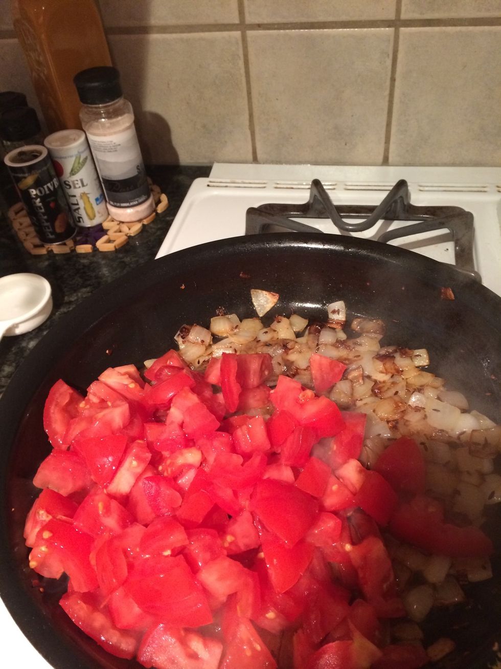 Add tomatoes and cook for another ten mins until it starts to break down