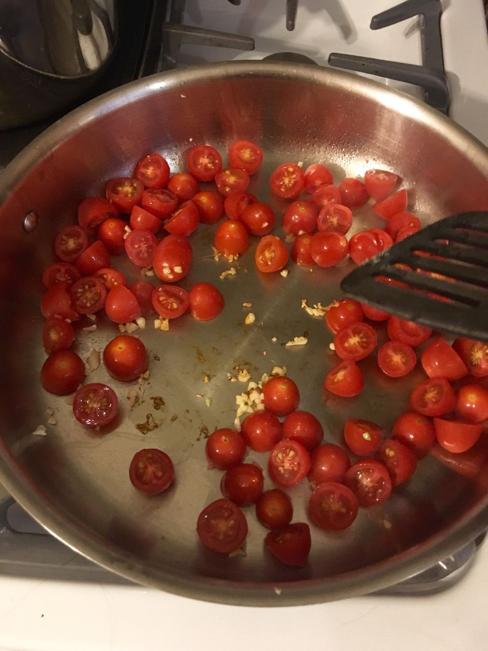 Add tomatoes (cook for 2-3 minutes or until juices released)