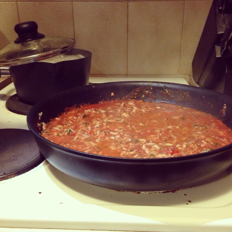 Add tomatoes, pur\u00e9e & lemon juice & stir. Simmer for 5 minutes at the same time start cooking pasta in boiling water