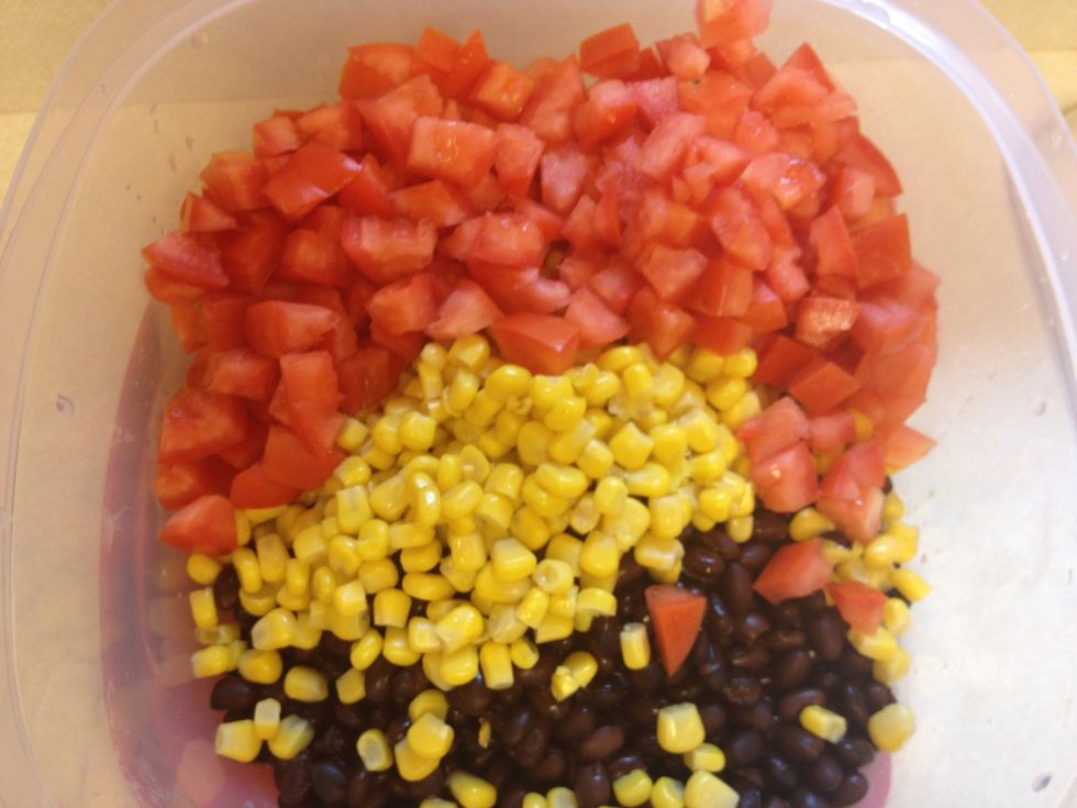 Add tomatoes to the bowl.