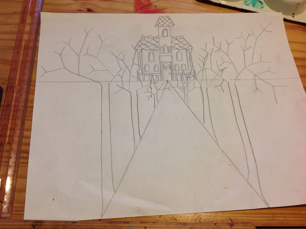 Add trees on each side of the road. The trees in the foreground should be larger than those going back near the house. Make sure the trees are VERTICAL