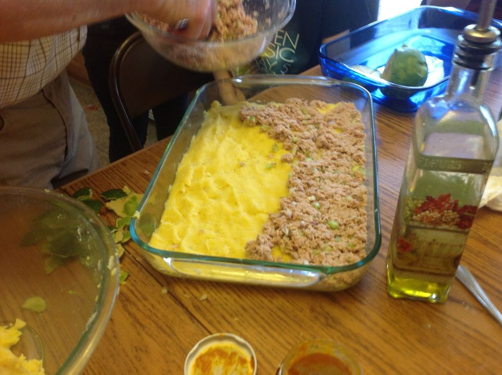 Add tuna to the top of the potato