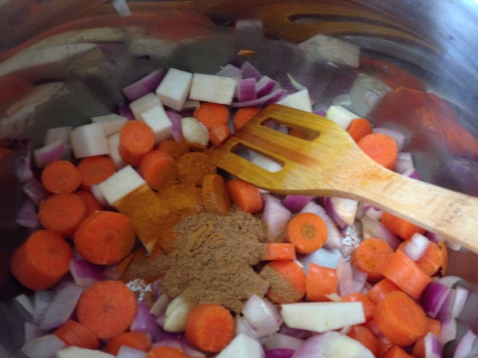 Add turmeric and cumin, heaping tablespoons are fine.