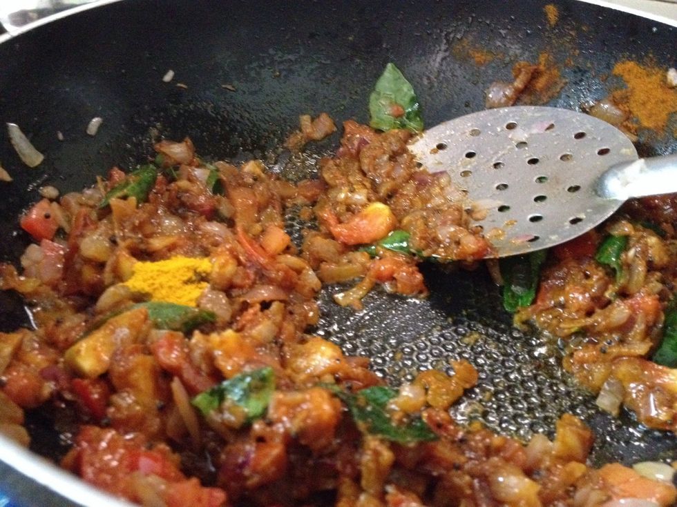 Add turmeric and saut\u00e9 well