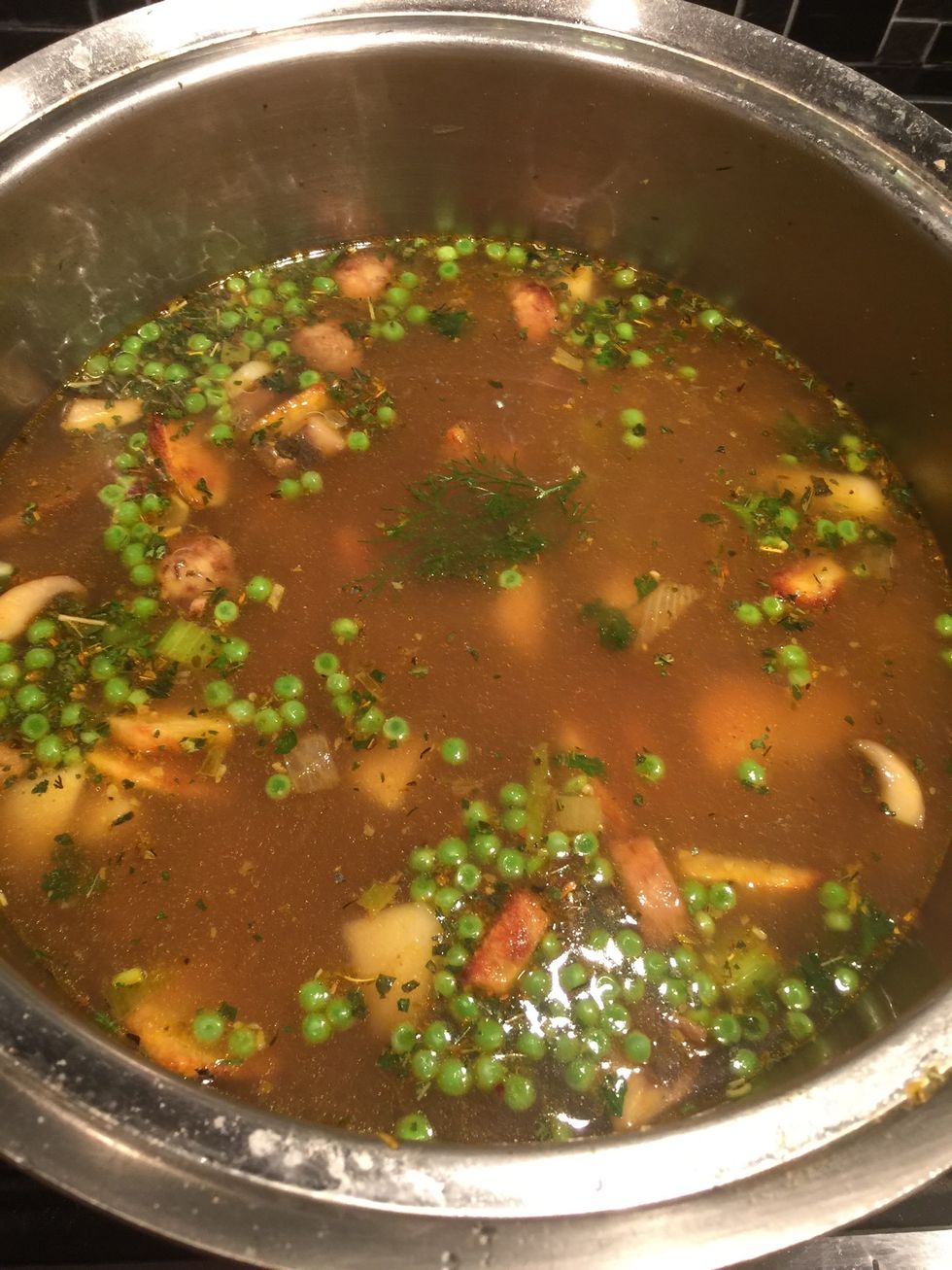 Add turmeric, dill, basil, salt, smoked paprika, chives, oregano, parsley, water and vegetable broth.