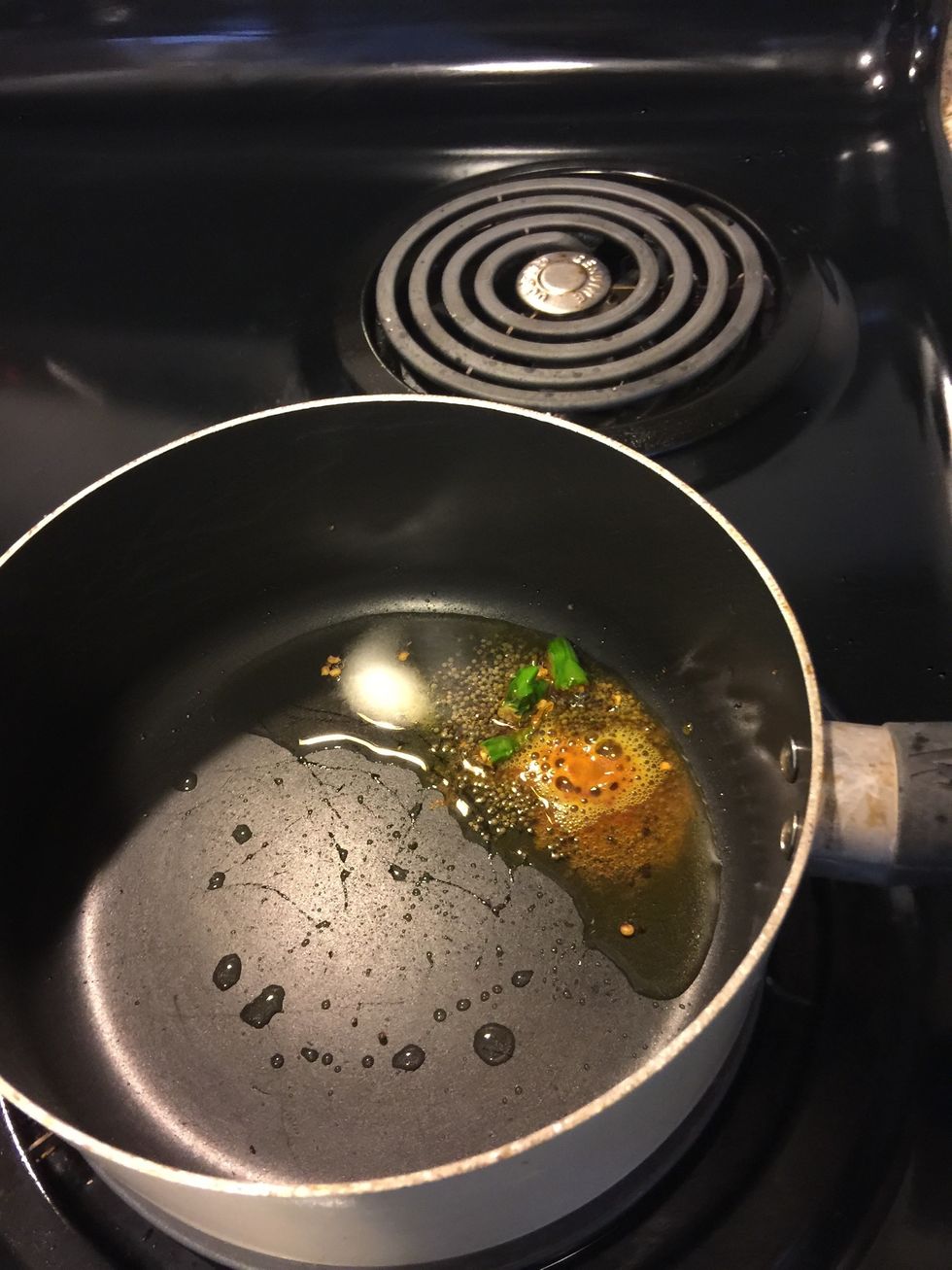 Add turmeric powder and salt.
