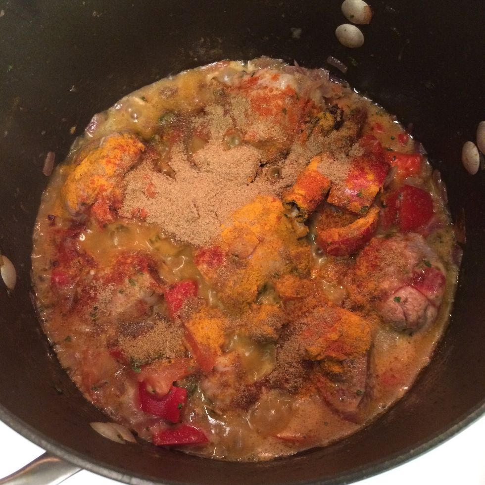 Add turmeric powder, cayenne pepper, ground cumin and ground coriander. Stir so that the spices get applied evenly.